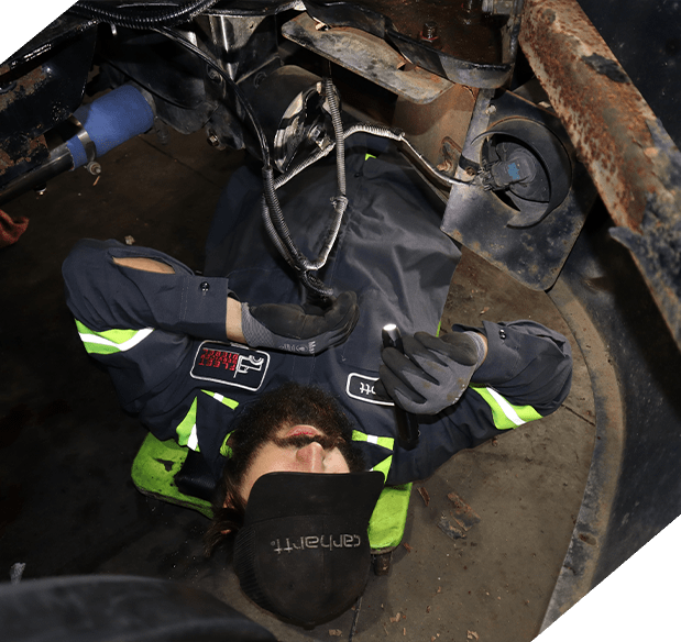 Mechanic Fixing Vehicle Lights - Electrical Repair