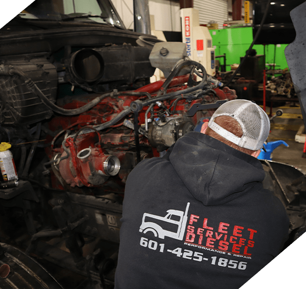 Mechanic Fixing Truck Engine - engine conversion specialist